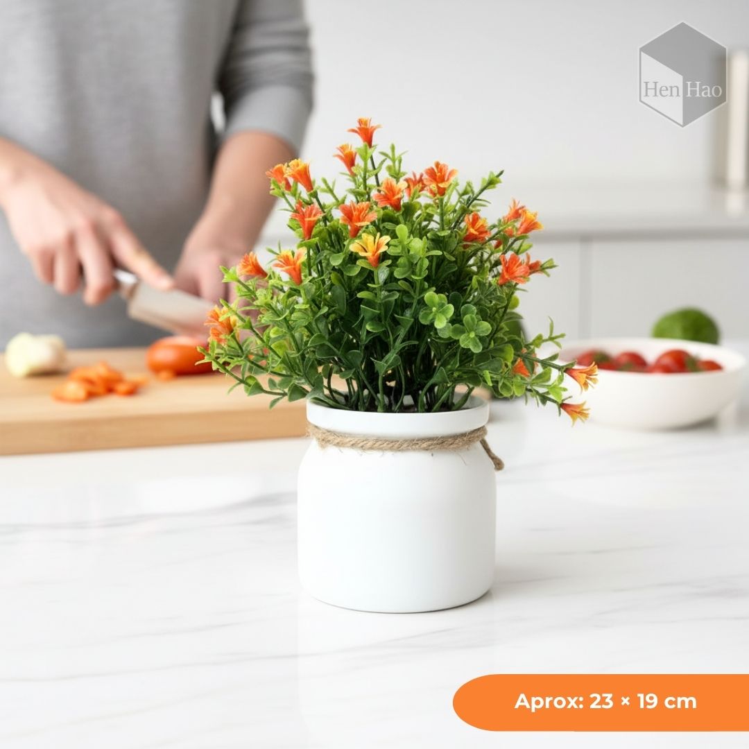 Planta decorativa artificial con flores