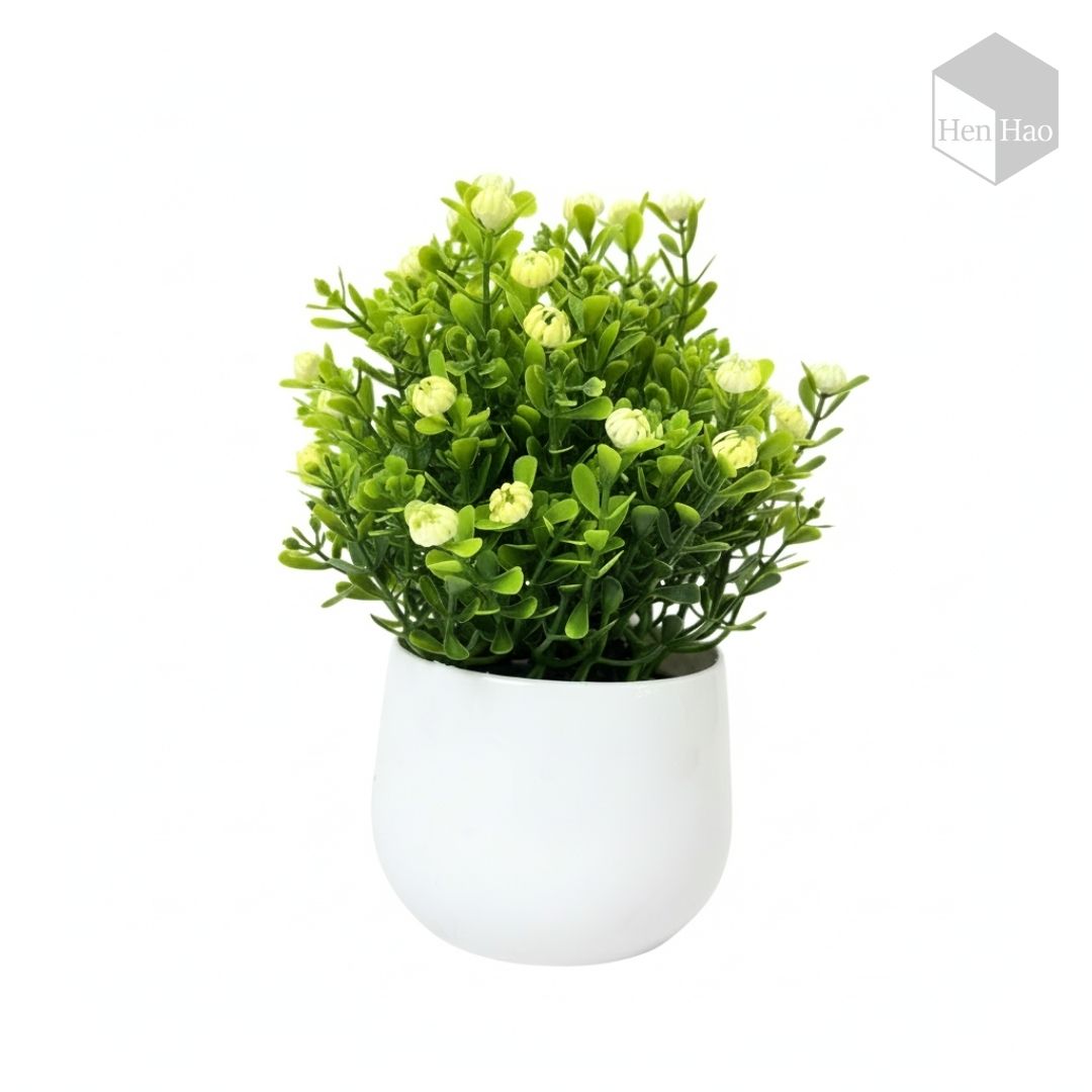 Planta decorativa artificial con flores