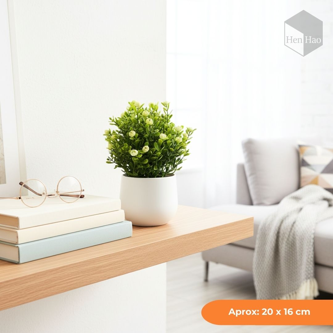 Planta decorativa artificial con flores
