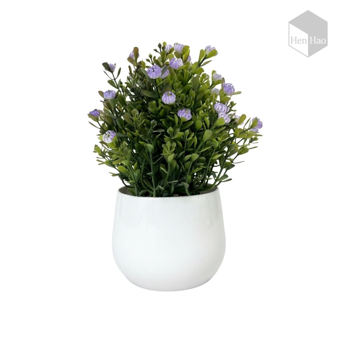 Planta decorativa artificial con flores