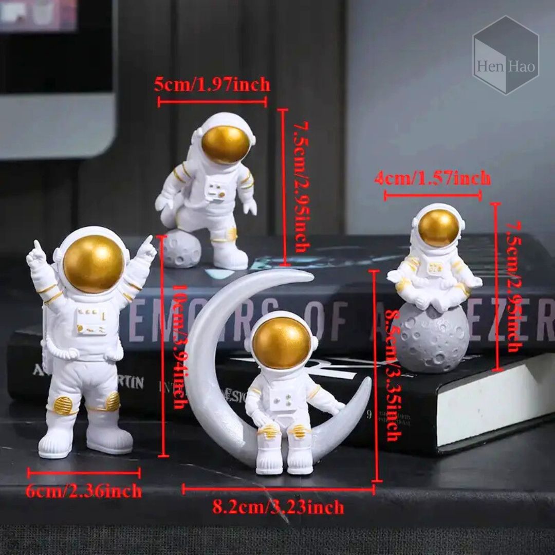 Set decorativo de 4 astronautas en miniatura