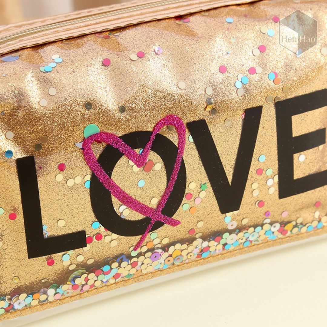 Neceser PVC transparente con glitter LOVE