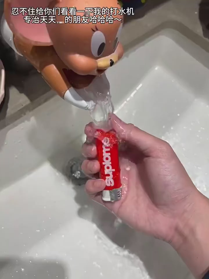 Encendedor sorpresa con rociador de agua